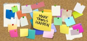 Bulletin Board with Make things Happen written on a note
