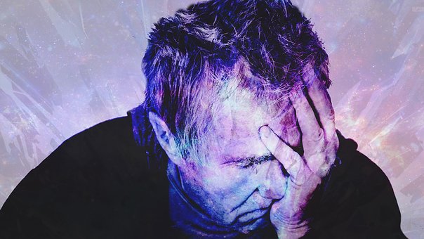 Man suffering from a headache