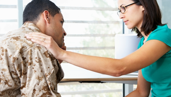 Therapist comforting a patient