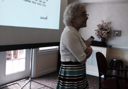 Anne presenting at a conference