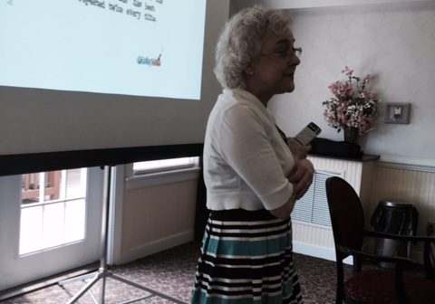 Anne presenting at a conference